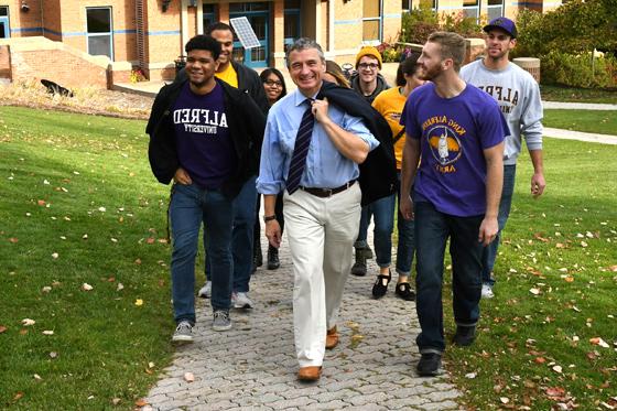 President Mark Zupan with students